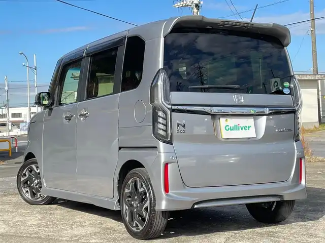 ホンダ Ｎ ＢＯＸ カスタム G L ターボ ホンダセンシング 千葉県 2018(平30)年 9.2万km ルナシルバーM Honda SENSING/・衝突軽減ブレーキ/・発進抑制機能/・後方誤発進抑制機能/・歩行者事故低減ステアリング/・路外逸脱抑制機能/・ACC〈アダプティブ・クルーズ・コントロール〉/・オートハイビーム/・先行車発進お知らせ機能/・標識認識機能/サイドエアバッグ/カーテンエアバッグシステム/ナビ装着スペシャルパッケージ＋ETC車載機/・AM/FM/地デジ/BTオーディオ/CD/DVD/両側パワースライドドア/ハーフレザーシート/リアサンシェード/パドルシフト/ドライブレコーダー/プッシュスタート/スマートキー/ブラック塗装＋切削 15インチアルミホイール/プライムスムース＆トリコットコンビシート/LEDヘッドランプ/保証書/取扱説明書/スペアキー