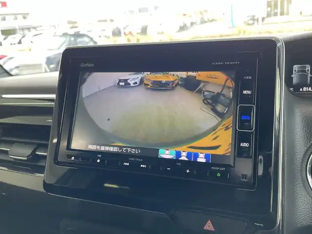 ホンダ Ｎ ＢＯＸ カスタム G L ターボ ホンダセンシング 千葉県 2018(平30)年 9.2万km ルナシルバーM Honda SENSING/・衝突軽減ブレーキ/・発進抑制機能/・後方誤発進抑制機能/・歩行者事故低減ステアリング/・路外逸脱抑制機能/・ACC〈アダプティブ・クルーズ・コントロール〉/・オートハイビーム/・先行車発進お知らせ機能/・標識認識機能/サイドエアバッグ/カーテンエアバッグシステム/ナビ装着スペシャルパッケージ＋ETC車載機/・AM/FM/地デジ/BTオーディオ/CD/DVD/両側パワースライドドア/ハーフレザーシート/リアサンシェード/パドルシフト/ドライブレコーダー/プッシュスタート/スマートキー/ブラック塗装＋切削 15インチアルミホイール/プライムスムース＆トリコットコンビシート/LEDヘッドランプ/保証書/取扱説明書/スペアキー