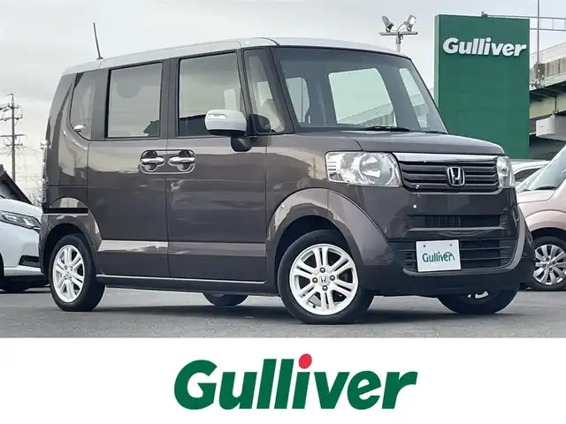 ホンダ Ｎ ＢＯＸ 2トーン G Lパッケージ 愛知県 2014(平26)年 6.8万km プレミアムブロンズパール バックカメラ/社外7インチメモリナビ【AVIC-MRZ099】/（AM/FM/CD/DVD/SD/BT/フルセグ）/片側パワースライドドア/ステアリングスイッチ/ETC/スマートキー/社外フロアマット/純正14インチアルミホイール