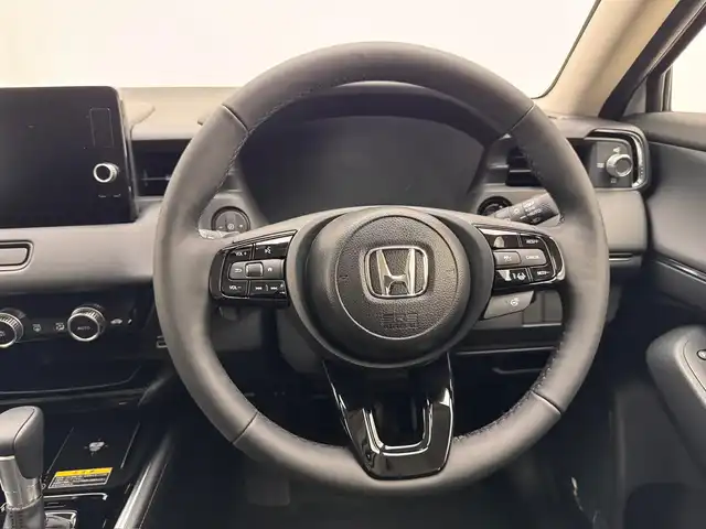 ホンダ ヴェゼル ハイブリッド e:HEV Z 兵庫県 2025(令7)年 0.1万km未満 プラチナホワイトパール 登録済未使用車/純正SDナビ(Bluetooth/apple carplay/androidauto/フルセグ)/バックカメラ/ワイヤレス充電/電子パーキングブレーキ/ブレーキホールド/前後コーナーセンサー/レーンキープアシスト/追従型クルーズコントロール/パワーバックドア/パドルシフト/ダウンヒルアシストコントロール/スマートキー/スペアキー/オートライト/LEDヘッドライト/ビルトインETC2.0/純正18インチアルミホイール