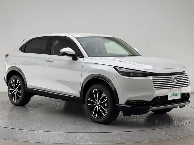 ホンダ ヴェゼル ハイブリッド e:HEV Z 兵庫県 2025(令7)年 0.1万km未満 プラチナホワイトパール 登録済未使用車/純正SDナビ(Bluetooth/apple carplay/androidauto/フルセグ)/バックカメラ/ワイヤレス充電/電子パーキングブレーキ/ブレーキホールド/前後コーナーセンサー/レーンキープアシスト/追従型クルーズコントロール/パワーバックドア/パドルシフト/ダウンヒルアシストコントロール/スマートキー/スペアキー/オートライト/LEDヘッドライト/ビルトインETC2.0/純正18インチアルミホイール