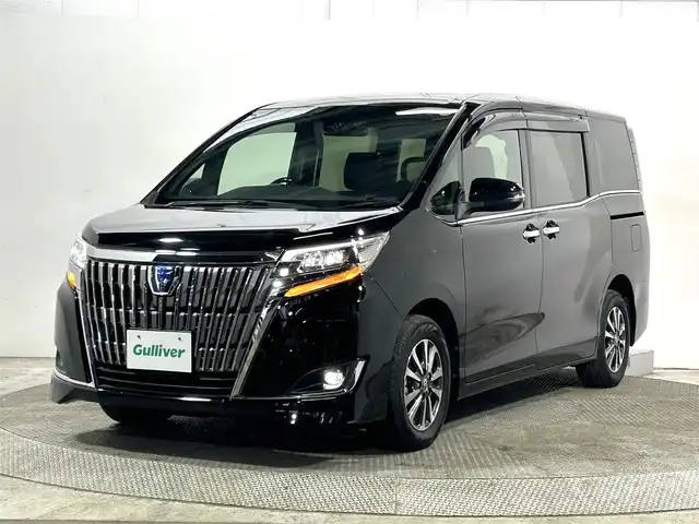 トヨタ エスクァイア ハイブリッド Gi 大阪府 2021(令3)年 2.8万km ブラック 純正9incナビ(フルセグ/DVD再生/Bluetooth) バックカメラ 後席モニター ETC 両側パワースライドドア 革シート シートヒーター 衝突軽減 クルコン トヨタセーフティセンス ドラレコ