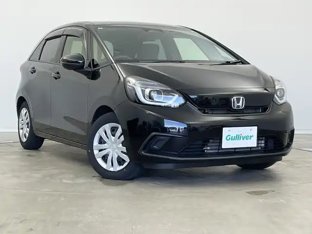 ホンダ フィット ホーム 新潟県 2021(令3)年 2.3万km クリスタルブラックパール ワンオーナー/純正ディーラーＯＰナビ/バックカメラ/フルセグＴＶ/前後ドライブレコーダー/ホンダセンシング/プッシュスタート/コーナーセンサー/オートライト/ＬＥＤヘッドライト/アイドリングストップ/オートブレーキホールド/ステアリングスイッチ/15インチスタッドレスＡＷ積込み