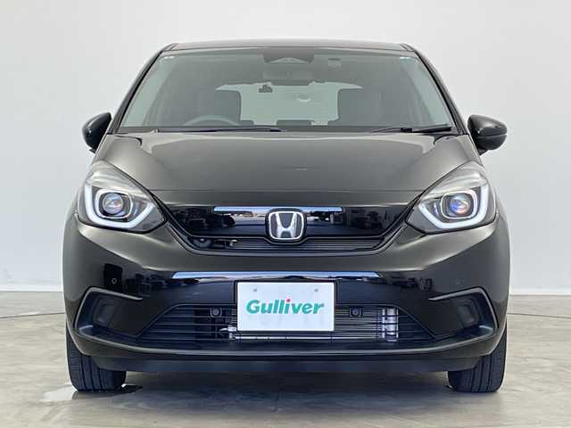 ホンダ フィット ホーム 新潟県 2021(令3)年 2.3万km クリスタルブラックパール ワンオーナー/純正ディーラーＯＰナビ/バックカメラ/フルセグＴＶ/前後ドライブレコーダー/ホンダセンシング/プッシュスタート/コーナーセンサー/オートライト/ＬＥＤヘッドライト/アイドリングストップ/オートブレーキホールド/ステアリングスイッチ/15インチスタッドレスＡＷ積込み