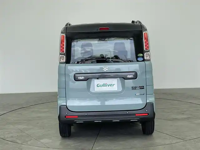 スズキ スペーシア ギア HYBRID XZ 愛知県 2020(令2)年 1.3万km オフブルーメタリック/ガンメタリック2トーンルーフ スズキセーフティサポート/　　・デュアルセンサーブレーキサポート/　　・後退時ブレーキサポート/　　・誤発進抑制機能/　　・車線逸脱抑制機能/　　・標識認識機能/ケンウッド製7インチナビ/　　CD/DVD/BT/フルセグ/バックカメラ/ステアリングリモコン/シートヒーター（前席）/両側パワースライドドア/ルーフレール/純正ホイールキャップ/純正LEDヘッドライト/フォグランプ/盗難防止機能