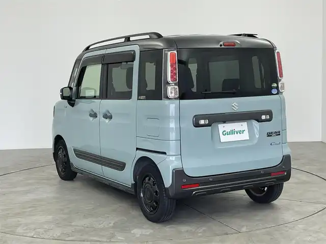 スズキ スペーシア ギア HYBRID XZ 愛知県 2020(令2)年 1.3万km オフブルーメタリック/ガンメタリック2トーンルーフ スズキセーフティサポート/　　・デュアルセンサーブレーキサポート/　　・後退時ブレーキサポート/　　・誤発進抑制機能/　　・車線逸脱抑制機能/　　・標識認識機能/ケンウッド製7インチナビ/　　CD/DVD/BT/フルセグ/バックカメラ/ステアリングリモコン/シートヒーター（前席）/両側パワースライドドア/ルーフレール/純正ホイールキャップ/純正LEDヘッドライト/フォグランプ/盗難防止機能