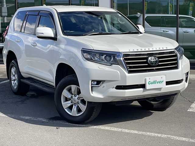 トヨタ ランドクルーザー プラド TX 道東・釧路十勝 2019(令1)年 5.8万km ホワイトパールクリスタルシャイン ・４WD/・プッシュスタート/・保証書/・取扱説明書/・MTモード付AT/・寒冷地仕様/・過給機/・AAC/・スペアキー/・スマートキー/・純正エンジンスターター/・追従型クルーズコントロール/・純正ナビ(BT/CD/DVD/AM/FM/TVフルセグ/HDMI)/・ETC/・前後ドライブレコーダー/・純正アルミホイール/・ABS/・横滑り防止/・盗難防止/・衝突軽減ブレーキ/・オートライト/・オートマチックハイビーム/・ダウンヒルアシストコントロール/・LEDヘッドライト/・ワイパーデアイサー/・アイドルアップ/・2ndスタート/・フォグライト/・純正ドアバイザー