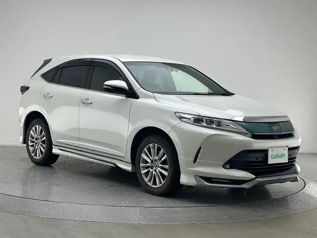 トヨタ ハリアー プレミアム メタル&レザーP 兵庫県 2018(平30)年 7.1万km ホワイトパールクリスタルシャイン アルパイン１０型メモリナビ（EX10Z）/（CD、DVD、SD、BT、フルセグ）/ドライブレコーダー/バックカメラ/コーナーセンサー/アイドリングストップ/レザーシート/パワーシート/シートヒーター/ベンチレーション/パワーバックドア/ACC/LDA/PCS/ビルトインETC/MODELLISTA（F.S.R）スポイラー/オートハイビーム/純正フロアマット/純正バイザー/純正１８インチAW