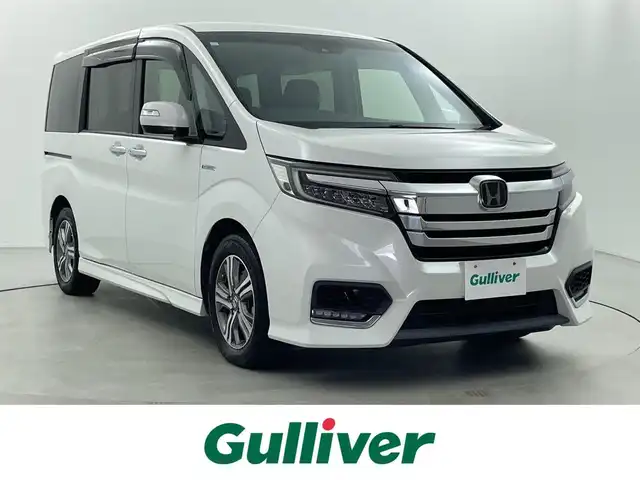 ホンダ ステップワゴン スパーダ ハイブリッド G EX ホンダセンシング 福井県 2019(平31)年 6.9万km プラチナホワイトパール 純正ナビ/CD/DVD/Bluetooth/フルセグ/両側パワースライドドア/ホンダセンシング/・衝突軽減ブレーキ/・誤発進抑制機能/・歩行者事故軽減ステアリング/・路外逸脱抑制機能/・アダプティブクルーズコントロール/バックカメラ/ETC/シートヒーター/ドアバイザー/プッシュスタート