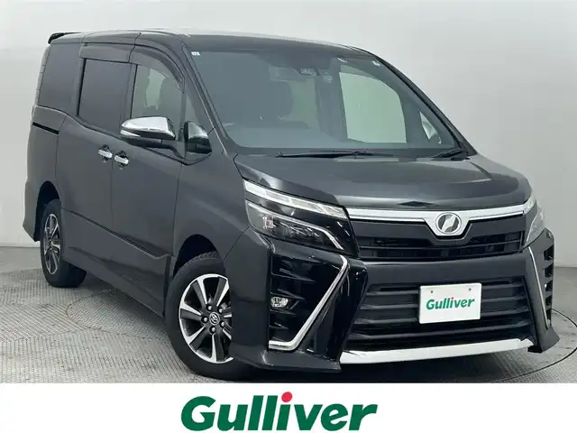 トヨタ ヴォクシー ZS 煌 道央・札幌 2017(平29)年 7.1万km ブラック ・4WD/・寒冷地仕様/・トヨタセーフティセンス/・衝突被害軽減ブレーキ/・レーンキープアシスト/・クルーズコントロール/・オートハイビーム/・先行車発進告知/・純正メモリナビ/・フルセグ/BT/CD/DVD/・バックカメラ/・フリップダウンモニター/・両側パワースライドドア/・ビルトインETC/・ドアロック連動ミラー/・アイドリングストップ/・スマートキー/・プッシュスタート