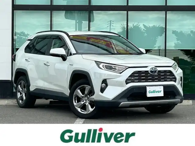 トヨタ ＲＡＶ４ ハイブリットG 和歌山県 2019(令1)年 13.1万km ホワイトパールクリスタルシャイン 純正9インチナビ/フルセグTV/(AM/FM/CD/Bluetooth)/バックカメラ/衝突軽減ブレーキ/横滑り防止機能/レーダークルコン/ブラインドスポットモニター/シートヒーター/ステアリングヒーター/パワーシート/ビルトインETC/前後ドラレコ/デジタルインナーミラー/ステアリングリモコン/シートメモリー/電動パーキング/オートホールド/LEDヘッドライト/フォグランプ