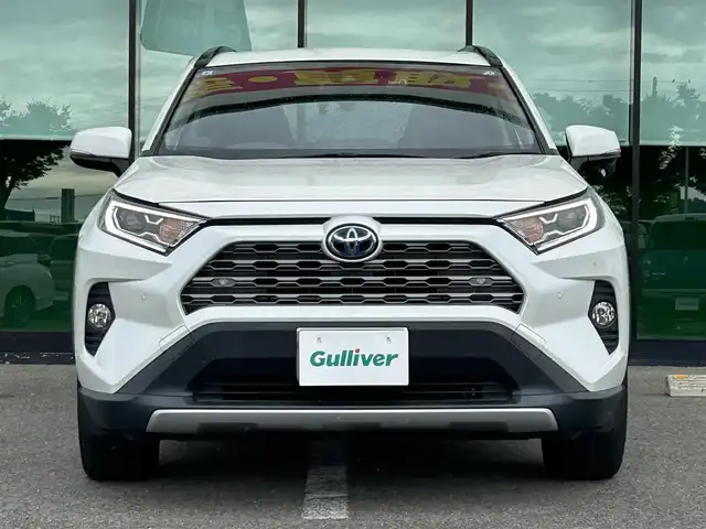 トヨタ ＲＡＶ４ ハイブリットG 和歌山県 2019(令1)年 13.1万km ホワイトパールクリスタルシャイン 純正9インチナビ/フルセグTV/(AM/FM/CD/Bluetooth)/バックカメラ/衝突軽減ブレーキ/横滑り防止機能/レーダークルコン/ブラインドスポットモニター/シートヒーター/ステアリングヒーター/パワーシート/ビルトインETC/前後ドラレコ/デジタルインナーミラー/ステアリングリモコン/シートメモリー/電動パーキング/オートホールド/LEDヘッドライト/フォグランプ