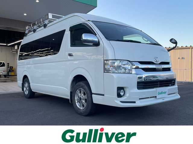 トヨタ ハイエース グランドキャビン 愛知県 2018(平30)年 3.4万km ホワイトパールクリスタルシャイン ワンオーナー/モデリスタエアロ/純正メモリナビ・フルセグTV/CD・DVD・Bluetooth/バックカメラ/パワースライドドア/モデリスタエアロ/純正LEDヘッドライト/純正ビルトインETC/Wエアバッグ/AC100Vコンセント電源/プリクラッシュセーフティ/ルーフキャリア