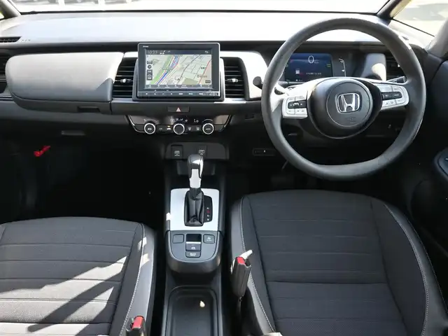 ホンダ フィット e:HEVクロスター 千葉県 2023(令5)年 1.4万km フィヨルドミストパール ホンダセンシング/・衝突軽減ブレーキ（CMBS）/・車線維持支援システム（LKAS）/・アダプティブクルーズコントロール（ACC）/・後方誤発進抑制機能/・誤発進抑制機能/ホンダコネクトナビ/地デジTV/【DVD/CD再生機能　Bluetooth接続】/バックカメラ/ハーフレザーシート/ETC/LEDヘッドライト/ウインカーミラー/コーナーセンサー/純正16インチアルミホイル/Honda スマートキー