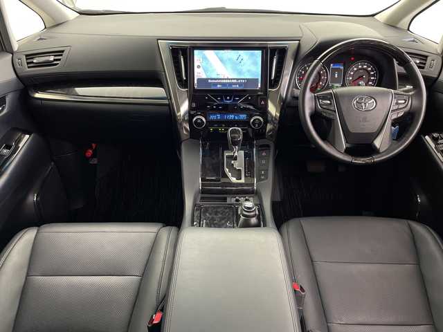 トヨタ アルファード S Cパッケージ 鹿児島県 2019(令1)年 1.5万km ホワイトパールクリスタルシャイン 社外9インチナビ/（AM/FM/CD/DVD/Bluetooth/フルセグ）/フリップダウンモニター/ツインムーンルーフ/モデリスタエアロ/デジタルインナーミラー/ETC/トヨタセーフティセンス/・プリクラッシュセーフティ/・レーントレーシングアシスト/・レーダークルーズコントロール/・ロードサインアシスト/・リアクロストラフィックアラート/・インテリジェントクリアランスソナー/・先行車発進お知らせ機能/両側パワースライドドア/パワーバックドア/電格ウィンカーミラー/オートブレーキホールド/レザーシート/シートヒーター/シートベンチレーション/フロアマット/純正18インチAW/オートライト