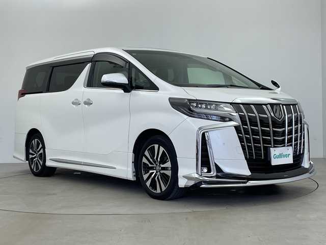 トヨタ アルファード S Cパッケージ 鹿児島県 2019(令1)年 1.5万km ホワイトパールクリスタルシャイン 社外9インチナビ/（AM/FM/CD/DVD/Bluetooth/フルセグ）/フリップダウンモニター/ツインムーンルーフ/モデリスタエアロ/デジタルインナーミラー/ETC/トヨタセーフティセンス/・プリクラッシュセーフティ/・レーントレーシングアシスト/・レーダークルーズコントロール/・ロードサインアシスト/・リアクロストラフィックアラート/・インテリジェントクリアランスソナー/・先行車発進お知らせ機能/両側パワースライドドア/パワーバックドア/電格ウィンカーミラー/オートブレーキホールド/レザーシート/シートヒーター/シートベンチレーション/フロアマット/純正18インチAW/オートライト