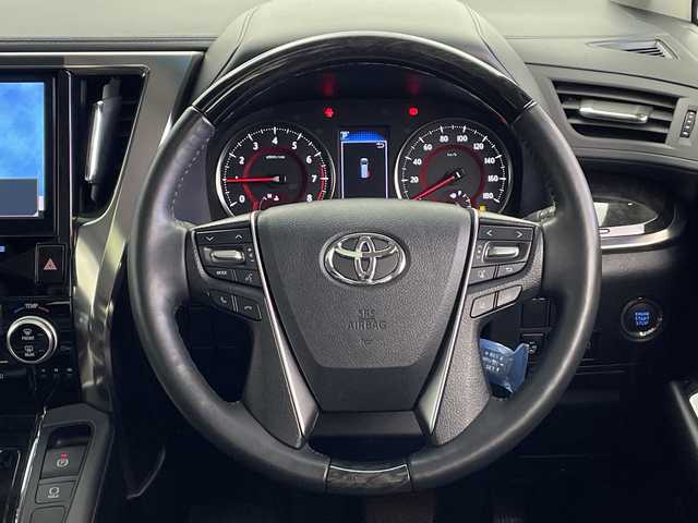 トヨタ アルファード S Cパッケージ 鹿児島県 2019(令1)年 1.5万km ホワイトパールクリスタルシャイン 社外9インチナビ/（AM/FM/CD/DVD/Bluetooth/フルセグ）/フリップダウンモニター/ツインムーンルーフ/モデリスタエアロ/デジタルインナーミラー/ETC/トヨタセーフティセンス/・プリクラッシュセーフティ/・レーントレーシングアシスト/・レーダークルーズコントロール/・ロードサインアシスト/・リアクロストラフィックアラート/・インテリジェントクリアランスソナー/・先行車発進お知らせ機能/両側パワースライドドア/パワーバックドア/電格ウィンカーミラー/オートブレーキホールド/レザーシート/シートヒーター/シートベンチレーション/フロアマット/純正18インチAW/オートライト