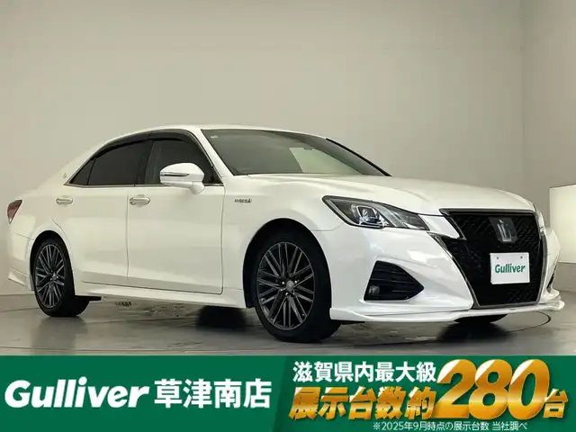 トヨタ クラウン ハイブリッド アスリートSJ-フロンティアLTD 滋賀県 2018(平30)年 3.2万km ホワイトパールクリスタルシャイン 純正8型ナビ/【Bluetooth/CD/DVD/USB/フルセグ】/社外エアロ/社外ガナドール4本だしマフラー/ハーフレザーシート/パワーシート/シートヒーター/ステアリングヒーター/純正１８AW/LEDヘッドライト/追従クルーズコントロール/前後ソナー/ビルトインETC/前後ドライブレコーダー/バックカメラ/スマートキー