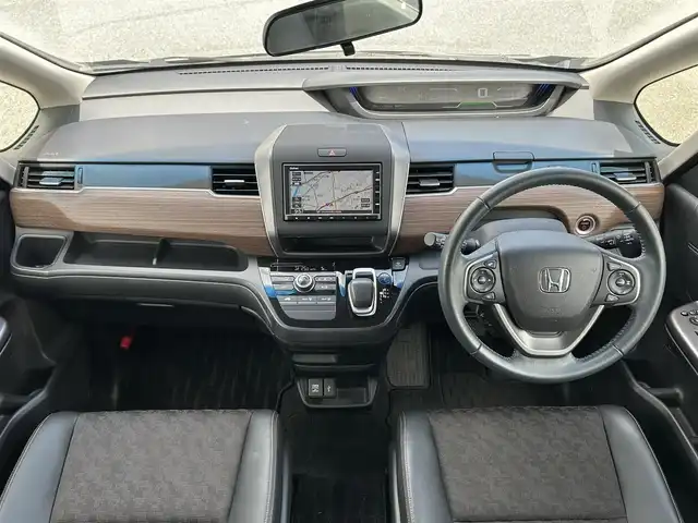 ホンダ フリード ハイブリット クロスター ホンダセンシング 茨城県 2020(令2)年 6.9万km スーパープラチナグレーメタリック 純正ナビ/バックカメラ/革巻きステアリング/ステアリングスイッチ/LEDヘッドライト/ホンダセンシング/両側パワースライドドア/ドライブレコーダー/コーナーセンサー/ビルドインETC/ハーフレザーシート/レーダークルーズコントロール