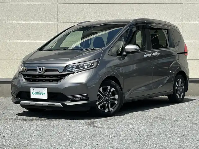 ホンダ フリード ハイブリット クロスター ホンダセンシング 茨城県 2020(令2)年 6.9万km スーパープラチナグレーメタリック 純正ナビ/バックカメラ/革巻きステアリング/ステアリングスイッチ/LEDヘッドライト/ホンダセンシング/両側パワースライドドア/ドライブレコーダー/コーナーセンサー/ビルドインETC/ハーフレザーシート/レーダークルーズコントロール