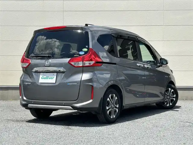 ホンダ フリード ハイブリット クロスター ホンダセンシング 茨城県 2020(令2)年 6.9万km スーパープラチナグレーメタリック 純正ナビ/バックカメラ/革巻きステアリング/ステアリングスイッチ/LEDヘッドライト/ホンダセンシング/両側パワースライドドア/ドライブレコーダー/コーナーセンサー/ビルドインETC/ハーフレザーシート/レーダークルーズコントロール