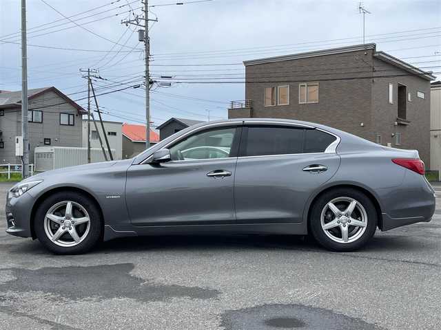 日産 スカイライン ハイブリッド 350GT FOUR Type P 道央・札幌 2016(平28)年 9.4万km ダークメタルグレー ４WD/純正メーカーナビ/CD/DVD/BT/フルセグ/横滑り防止装置/レーダークルーズコントロール/クリアランスソナー/アラウンドビューモニター/ビルトインETC/ドライブレコーダー/DRIVEMODE/前席パワーシート/D席メモリーシート/前席シートヒーター/レザーシート/革巻きステアリング/ステアリングリモコン/自動防眩ミラー/MTモード付AT/プッシュスタート/スマートキー/LEDヘッドライト/オートライト/フォグランプ/電動格納ミラー/ウィンカーミラー/純正フロアマット/ドアバイザー