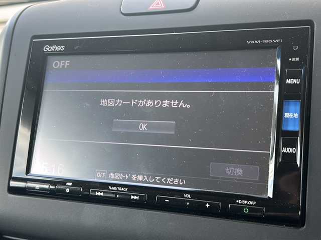 ホンダ フリード ハイブリット G ホンダセンシング 静岡県 2018(平30)年 9.2万km ホワイトオーキッドパール 【安全装備】/ホンダセンシング/アダプティブ・クルーズ・コントロール（ACC）/・作動車速域：約30km/hから100km/h間/車線維持支援システム（LKAS）/・作動車速：約65km/hから100km/h間/・ステアリング制御/衝突軽減ブレーキ（CMBS）/・歩行者検知機能/・作動車速：約80km/h未満時/・対向車車速：約30km/hから80km/h時/誤発進抑制機能（前進）/・ミリ波レーダー検知：作動車速10km/h未満/歩行者事故低減ステアリング/・作動車速10km/hから40km/h間/路外逸脱抑制機能/・作動車速：約60km/hから100km/h間/先行車発進お知らせ機能/標識認識機能/【主要装備】/純正ナビ　/フルセグ　/バックカメラ　/スマートキー　/プッシュスタート　/ＬＥＤヘッドライト　/両側パワースライドドア　/ハーフレザーシート　/ステアリングスイッチ　
