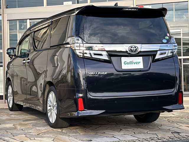 トヨタ ヴェルファイア Z Aエディション 静岡県 2019(令1)年 6.8万km スパークリングブラックパールクリスタルシャイン 純正SDナビ/・CD/・DVD/・フルセグＴＶ/・Bluetooth/・AM/・FM/主要装備/・純正後席モニター/・両側パワスラ/・衝突軽減/・レーンキープ/・追従クルコン/・コーナーセンサー前後/・前方ドライブレコーダー/・ビルトインETC2.0/・MTモード付/・ステアリングスイッチ/・電動パーキングブレーキ/・オートホールド/・純正フロアマット/・LEDヘッドライト/・オートハイビーム/・フォグランプ/・オットマン