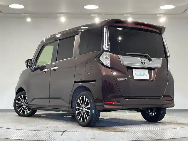 トヨタ ルーミー カスタムG－T 愛知県 2021(令3)年 2.2万km プラムブラウンパールクリスタルシャイン 純正9インチナビ/（Bluetooth/AM/FM/SDナビ/フルセグTV）/両側電動スライドドア/レーダークルーズコントロール/衝突軽減ブレーキ/バックモニター/ETC/LEDオートライト/純正15インチAW/スマートキー/コーナーセンサー/プッシュスタートボタン/後席サンシェード/USB接続