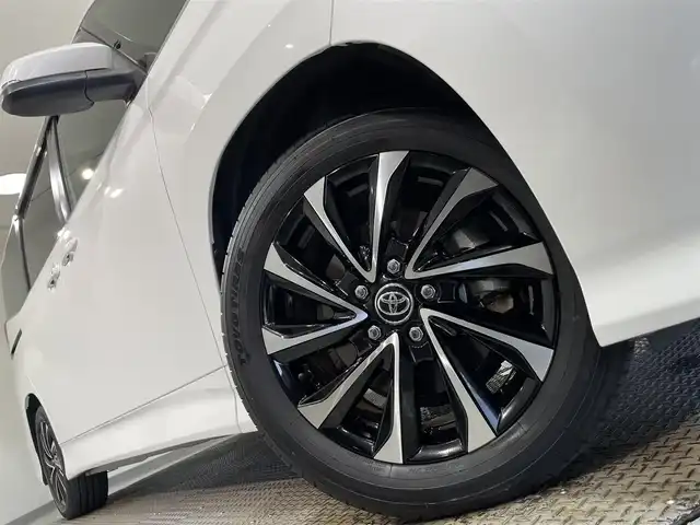 トヨタ ノア ハイブリッド S－Z 愛知県 2023(令5)年 1.7万km ホワイトパールクリスタルシャイン 純正１０．５インチナビ/快適利便パッケージ/両側パワースライドドア/衝突軽減ブレーキ/レーダークルーズコントロール/レーンディパーチャーアラート/クリアランスソナー/パワーバックドア/電動パーキングブレーキ/ブレーキホールド/オットマン/ハーフレザー/シートヒーター/前後ドライブレコーダー/ビルトインＥＴＣ２．０/AC100V 1500W コンセント/ISOFIX/純正フロアマット/純正17インチアルミホイール