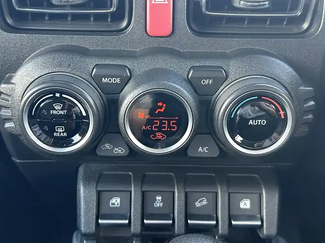 スズキ ジムニー シエラ JC 岡山県 2019(令1)年 6万km ジャングルグリーン 登録時走行距離59289km/ワンオーナー/社外ナビ/フルセグTV(AM.FM.CD.DVD.TV.BT)/バックカメラ/ETC/D/N席シートヒーター/衝突軽減ブレーキ/レーダークルーズコントロール/レーンキープアシスト/ダウンヒルアシストコントロール/横滑り防止装置/USB入力端子/オートライト/15インチ純正AW/オープンカントリーATタイヤ/純正フロアマット/純正OPフロントグリル/ルーフキャリア