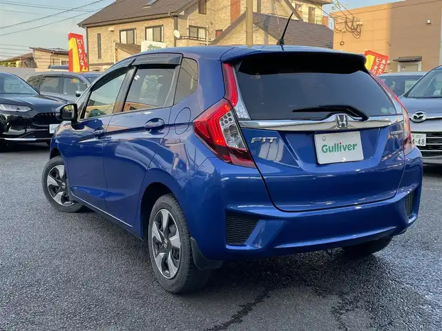 ホンダ フィット ハイブリット Fパッケージ 大分県 2016(平28)年 10.9万km ブリリアントスポーティブルーメタリック2トーン 〇純正メモリーナビ（VXM-164CSi）/　CD/DVD/BT/ワンセグ/ラジオ/〇バックカメラ/〇社外サイドカメラ/〇ETC/〇スマートキー/〇エンジンプッシュスタート/〇ステアリングスイッチ/〇ウインカーミラー/〇フロアマット/〇ドアバイザー/〇プライバシーガラス/〇ヘッドライトレベライザー/〇取扱説明書/〇スペアキー