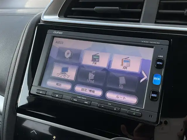 ホンダ フィット ハイブリット Fパッケージ 大分県 2016(平28)年 10.9万km ブリリアントスポーティブルーメタリック2トーン 〇純正メモリーナビ（VXM-164CSi）/　CD/DVD/BT/ワンセグ/ラジオ/〇バックカメラ/〇社外サイドカメラ/〇ETC/〇スマートキー/〇エンジンプッシュスタート/〇ステアリングスイッチ/〇ウインカーミラー/〇フロアマット/〇ドアバイザー/〇プライバシーガラス/〇ヘッドライトレベライザー/〇取扱説明書/〇スペアキー