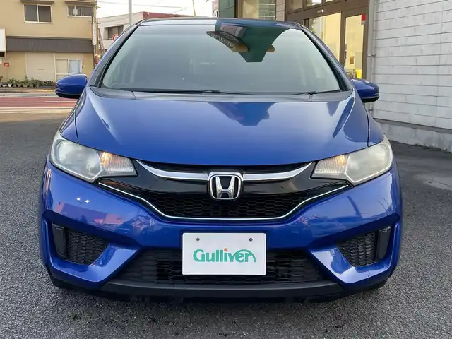 ホンダ フィット ハイブリット Fパッケージ 大分県 2016(平28)年 10.9万km ブリリアントスポーティブルーメタリック2トーン 〇純正メモリーナビ（VXM-164CSi）/　CD/DVD/BT/ワンセグ/ラジオ/〇バックカメラ/〇社外サイドカメラ/〇ETC/〇スマートキー/〇エンジンプッシュスタート/〇ステアリングスイッチ/〇ウインカーミラー/〇フロアマット/〇ドアバイザー/〇プライバシーガラス/〇ヘッドライトレベライザー/〇取扱説明書/〇スペアキー