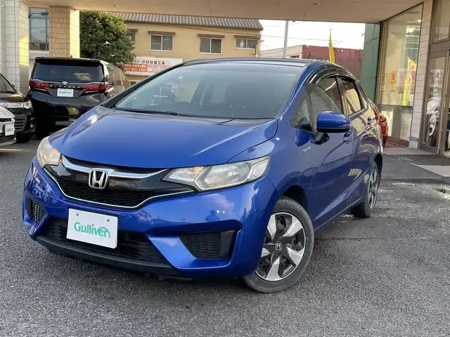 ホンダ フィット ハイブリット Fパッケージ 大分県 2016(平28)年 10.9万km ブリリアントスポーティブルーメタリック2トーン 〇純正メモリーナビ（VXM-164CSi）/　CD/DVD/BT/ワンセグ/ラジオ/〇バックカメラ/〇社外サイドカメラ/〇ETC/〇スマートキー/〇エンジンプッシュスタート/〇ステアリングスイッチ/〇ウインカーミラー/〇フロアマット/〇ドアバイザー/〇プライバシーガラス/〇ヘッドライトレベライザー/〇取扱説明書/〇スペアキー