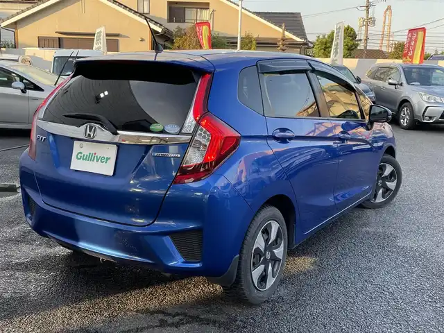 ホンダ フィット ハイブリット Fパッケージ 大分県 2016(平28)年 10.9万km ブリリアントスポーティブルーメタリック2トーン 〇純正メモリーナビ（VXM-164CSi）/　CD/DVD/BT/ワンセグ/ラジオ/〇バックカメラ/〇社外サイドカメラ/〇ETC/〇スマートキー/〇エンジンプッシュスタート/〇ステアリングスイッチ/〇ウインカーミラー/〇フロアマット/〇ドアバイザー/〇プライバシーガラス/〇ヘッドライトレベライザー/〇取扱説明書/〇スペアキー