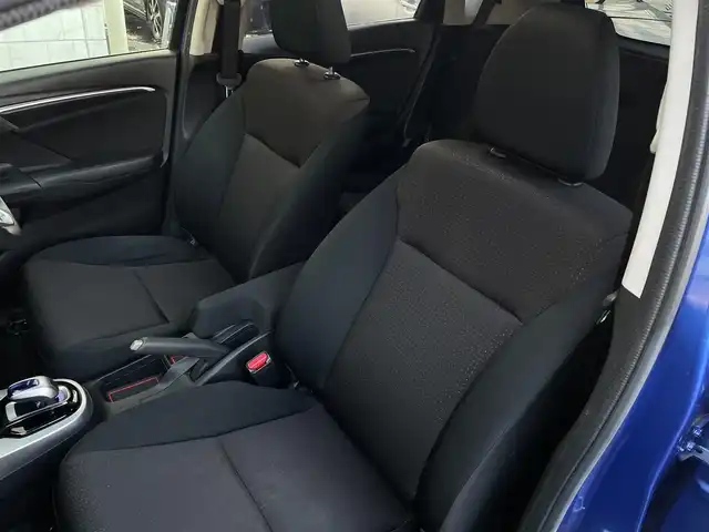 ホンダ フィット ハイブリット Fパッケージ 大分県 2016(平28)年 10.9万km ブリリアントスポーティブルーメタリック2トーン 〇純正メモリーナビ（VXM-164CSi）/　CD/DVD/BT/ワンセグ/ラジオ/〇バックカメラ/〇社外サイドカメラ/〇ETC/〇スマートキー/〇エンジンプッシュスタート/〇ステアリングスイッチ/〇ウインカーミラー/〇フロアマット/〇ドアバイザー/〇プライバシーガラス/〇ヘッドライトレベライザー/〇取扱説明書/〇スペアキー