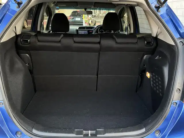 ホンダ フィット ハイブリット Fパッケージ 大分県 2016(平28)年 10.9万km ブリリアントスポーティブルーメタリック2トーン 〇純正メモリーナビ（VXM-164CSi）/　CD/DVD/BT/ワンセグ/ラジオ/〇バックカメラ/〇社外サイドカメラ/〇ETC/〇スマートキー/〇エンジンプッシュスタート/〇ステアリングスイッチ/〇ウインカーミラー/〇フロアマット/〇ドアバイザー/〇プライバシーガラス/〇ヘッドライトレベライザー/〇取扱説明書/〇スペアキー