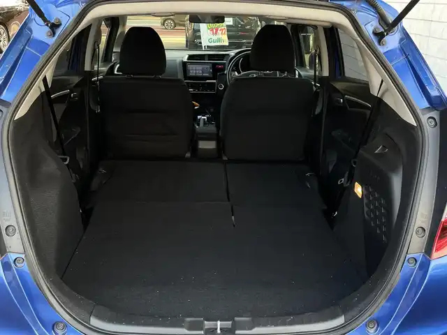 ホンダ フィット ハイブリット Fパッケージ 大分県 2016(平28)年 10.9万km ブリリアントスポーティブルーメタリック2トーン 〇純正メモリーナビ（VXM-164CSi）/　CD/DVD/BT/ワンセグ/ラジオ/〇バックカメラ/〇社外サイドカメラ/〇ETC/〇スマートキー/〇エンジンプッシュスタート/〇ステアリングスイッチ/〇ウインカーミラー/〇フロアマット/〇ドアバイザー/〇プライバシーガラス/〇ヘッドライトレベライザー/〇取扱説明書/〇スペアキー