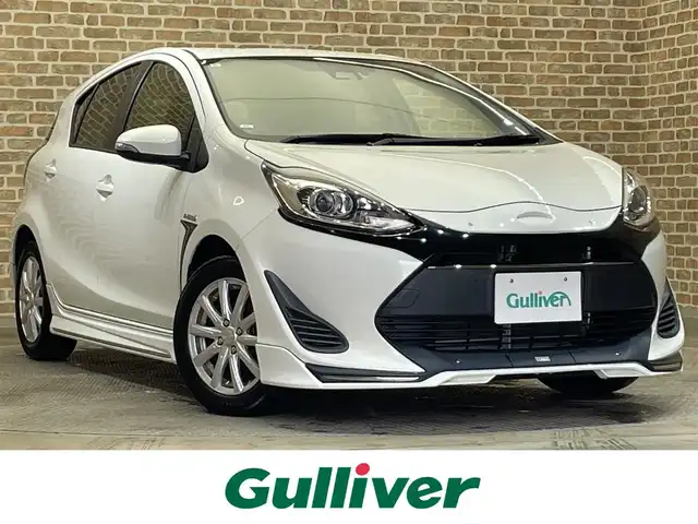 トヨタ アクア S 岩手県 2017(平29)年 4.8万km ライムホワイトパールクリスタルシャイン TRDエアロ　フロントスポイラー・サイドスカート・リヤバンパースポイラー・フロントバンパーガーニッシュ・フロントフェンダーガーニッシュ・テールゲートスポイラー/トヨタセーフティセンスC/プリクラッシュセーフティ/レーンディパーチャーアラート/オートマチックハイビーム/先行車発進告知機能/横滑り防止装置/純正ナビ/ステアリングスイッチ/フルセグTV/バックカメラ/ETC2.0/ドライブレコーダー/オートライト/ヘッドライトレベライザー/社外１５インチアルミホイール