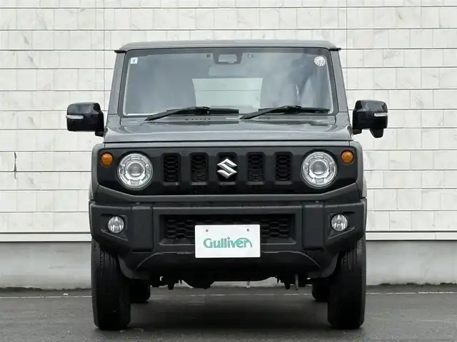 スズキ ジムニー XC 岩手県 2024(令6)年 2.2万km ミディアムグレー 禁煙車/4WD（切替）/前席シートヒーター/社外ナビ/→フルセグTV/Bluetooth/CD/FM/AM/バックドア/ステアリングスイッチ/横滑り防止装置/クルーズコントロール/リアコーナーセンサー/レーンキープアシスト/衝突軽減システム/ダウンヒルアシストコントロール/オートライト/LEDヘッドライト/フォグライト/〇プッシュスタート/〇電動格納ミラー/〇ウィンカーミラー/〇フロアマット/〇シガーソケット/〇スマートキー/スペアキー/前方ドライブレコーダー/ETC