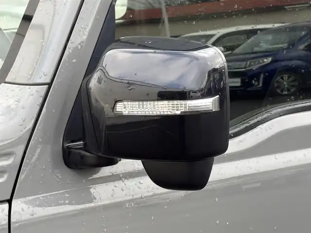 スズキ ジムニー XC 岩手県 2024(令6)年 2.2万km ミディアムグレー 禁煙車/4WD（切替）/前席シートヒーター/社外ナビ/→フルセグTV/Bluetooth/CD/FM/AM/バックドア/ステアリングスイッチ/横滑り防止装置/クルーズコントロール/リアコーナーセンサー/レーンキープアシスト/衝突軽減システム/ダウンヒルアシストコントロール/オートライト/LEDヘッドライト/フォグライト/〇プッシュスタート/〇電動格納ミラー/〇ウィンカーミラー/〇フロアマット/〇シガーソケット/〇スマートキー/スペアキー/前方ドライブレコーダー/ETC