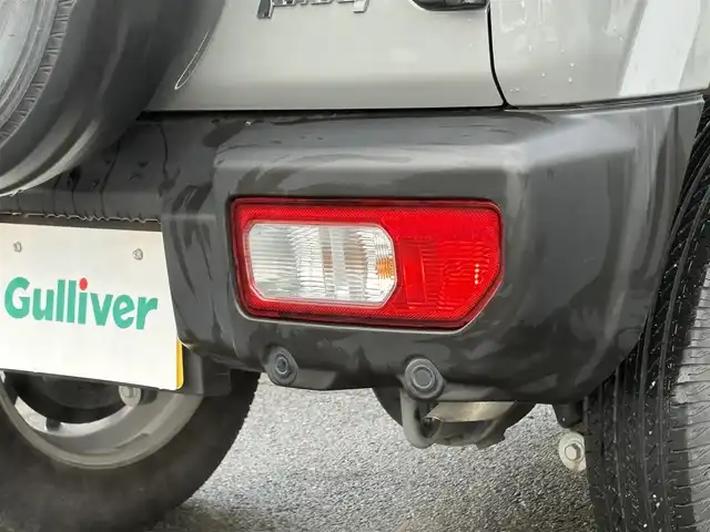 スズキ ジムニー XC 岩手県 2024(令6)年 2.2万km ミディアムグレー 禁煙車/4WD（切替）/前席シートヒーター/社外ナビ/→フルセグTV/Bluetooth/CD/FM/AM/バックドア/ステアリングスイッチ/横滑り防止装置/クルーズコントロール/リアコーナーセンサー/レーンキープアシスト/衝突軽減システム/ダウンヒルアシストコントロール/オートライト/LEDヘッドライト/フォグライト/〇プッシュスタート/〇電動格納ミラー/〇ウィンカーミラー/〇フロアマット/〇シガーソケット/〇スマートキー/スペアキー/前方ドライブレコーダー/ETC