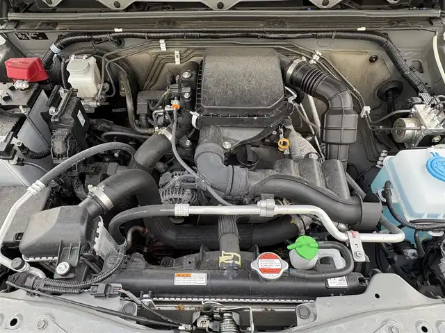 スズキ ジムニー XC 岩手県 2024(令6)年 2.2万km ミディアムグレー 禁煙車/4WD（切替）/前席シートヒーター/社外ナビ/→フルセグTV/Bluetooth/CD/FM/AM/バックドア/ステアリングスイッチ/横滑り防止装置/クルーズコントロール/リアコーナーセンサー/レーンキープアシスト/衝突軽減システム/ダウンヒルアシストコントロール/オートライト/LEDヘッドライト/フォグライト/〇プッシュスタート/〇電動格納ミラー/〇ウィンカーミラー/〇フロアマット/〇シガーソケット/〇スマートキー/スペアキー/前方ドライブレコーダー/ETC