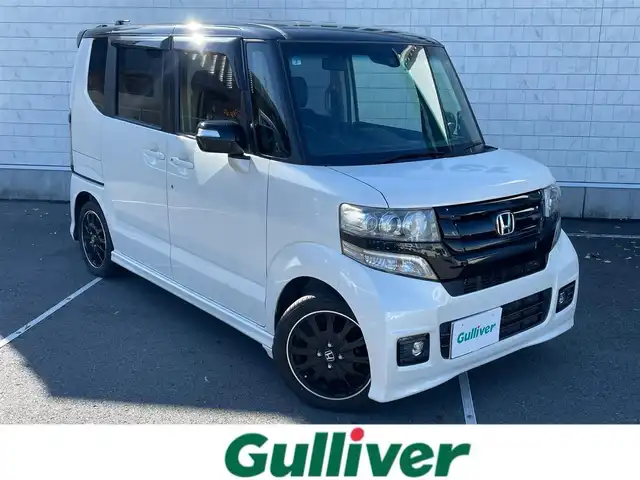 ホンダ Ｎ ＢＯＸ 2トーン カスタム G ターボLパッケージ 静岡県 2015(平27)年 9.6万km 白Ⅱ 純正ナビ　/・フルセグＴＶ　/・Ｂｌｕｅｔｏｏｔｈ接続　/・ＤＶＤ再生　/クルーズコントロール　/ＣＴＢＡ　/両側パワースライドドア　/プッシュスタート　/スマートキー　/スペアキー　/バックカメラ　/ＨＩＤオートライト/取扱説明書/保証書