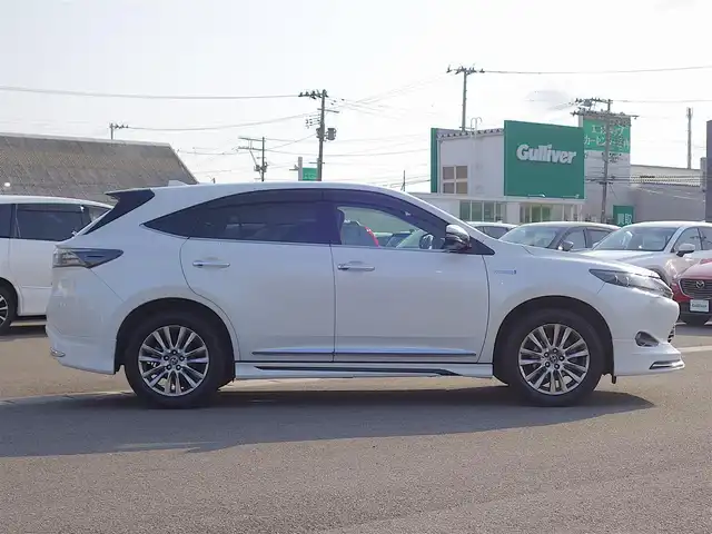 トヨタ ハリアー ハイブリッド プレミアム アドバンスドP 山形県 2015(平27)年 9.9万km ホワイトパールクリスタルシャイン 4WD/JBLプレミアムサウンドシステム/衝突被害軽減システム/純正SDナビ/　　【CD DVD BD BT フルセグ USB AUX】/全周囲カメラ/電動リアゲート/レーダークルーズコントロール/LEDオートヘッドライト/ハーフレザーシート/パワーシート/モデリスタエアロ/純正18インチアルミホイール/ドライブレコーダー/アイドリングストップ/ステアリングスイッチ/MTモード付AT/電動格納ウィンカーミラー/フォグランプ/スマートキー/ETC