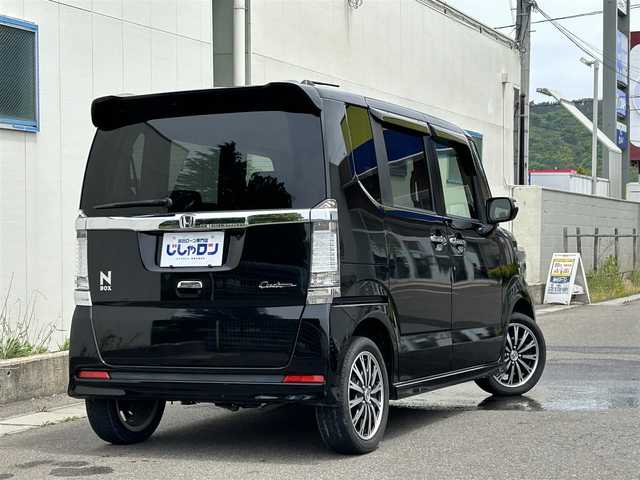ホンダ Ｎ ＢＯＸ カスタム G ターボ Aパッケージ 福島県 2014(平26)年 8.6万km スマートブラック (株)IDOMが運営する【じしゃロン福島店】の自社ローン専用車両になります。こちらは現金またはオートローンご利用時の価格です。自社ローンご希望の方は別途その旨お申付け下さい/純正ナビ/クルーズコントロール/MT付AT/ドアバイザー/革巻きステアリング/ステアリングリモコン/フルセグテレビ/両側パワースライドドア/カーテンエアバッグ/ETC/社外AW積込