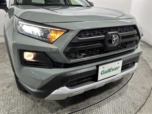 トヨタ ＲＡＶ４ アドベンチャー 新潟県 2019(令1)年 1.3万km アッシュグレーメタリック/アーバンカーキ 純正9incナビ(フルセグ/DVD再生/Bluetooth) バックカメラ ETC 革シート パワーシート 衝突軽減 レーダークルコン クリアランスソナー トヨタセーフティセンス ドラレコ ４WD
