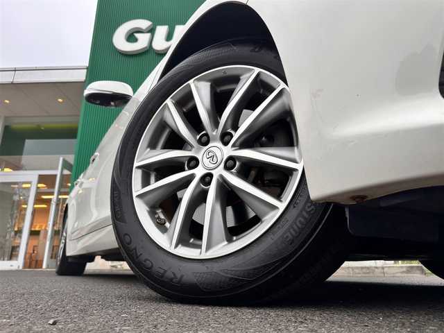 日産 スカイライン ハイブリッド 350GT Type P 宮城県 2014(平26)年 7万km クリスタルホワイトパール 車線逸脱防止支援システム/車線逸脱警報/後側方衝突防止支援システム/後側方車両検知警報/後退時衝突防止支援システム/前方衝突予測警報/エマージェンシーブレーキ/インテリジェントクルーズコントロール/インテリジェントペダル/アラウンドビューモニター/フロント・バックソナー/ダイレクトアダプティブステアリング/アクティブレーンコントロール/純正ナビ/・CD/DVD/・Bluetooth/・フルセグTV/・USB端子/ビルトインETC/本革シート/シートヒーター（前席）/パワーシート（運転席メモリー機能付）/革巻きステアリング/ステアリングスイッチ/LEDヘッドランプ/フォグランプ/オートライト/スマートキー＆プッシュスタート/電動格納ミラー/純正17インチAW/純正フロアマット/ドアバイザー/W/サイド/カーテンエアバッグ