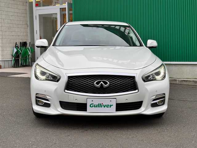 日産 スカイライン ハイブリッド 350GT Type P 宮城県 2014(平26)年 7万km クリスタルホワイトパール 車線逸脱防止支援システム/車線逸脱警報/後側方衝突防止支援システム/後側方車両検知警報/後退時衝突防止支援システム/前方衝突予測警報/エマージェンシーブレーキ/インテリジェントクルーズコントロール/インテリジェントペダル/アラウンドビューモニター/フロント・バックソナー/ダイレクトアダプティブステアリング/アクティブレーンコントロール/純正ナビ/・CD/DVD/・Bluetooth/・フルセグTV/・USB端子/ビルトインETC/本革シート/シートヒーター（前席）/パワーシート（運転席メモリー機能付）/革巻きステアリング/ステアリングスイッチ/LEDヘッドランプ/フォグランプ/オートライト/スマートキー＆プッシュスタート/電動格納ミラー/純正17インチAW/純正フロアマット/ドアバイザー/W/サイド/カーテンエアバッグ